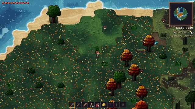 Ein Wald mit orangefarbenen Ahornbäumen und Laubstreu neben einer Bucht.